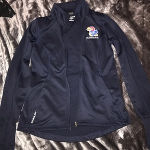 Navy blue Kansas Jayhawks jacket with thumb holes